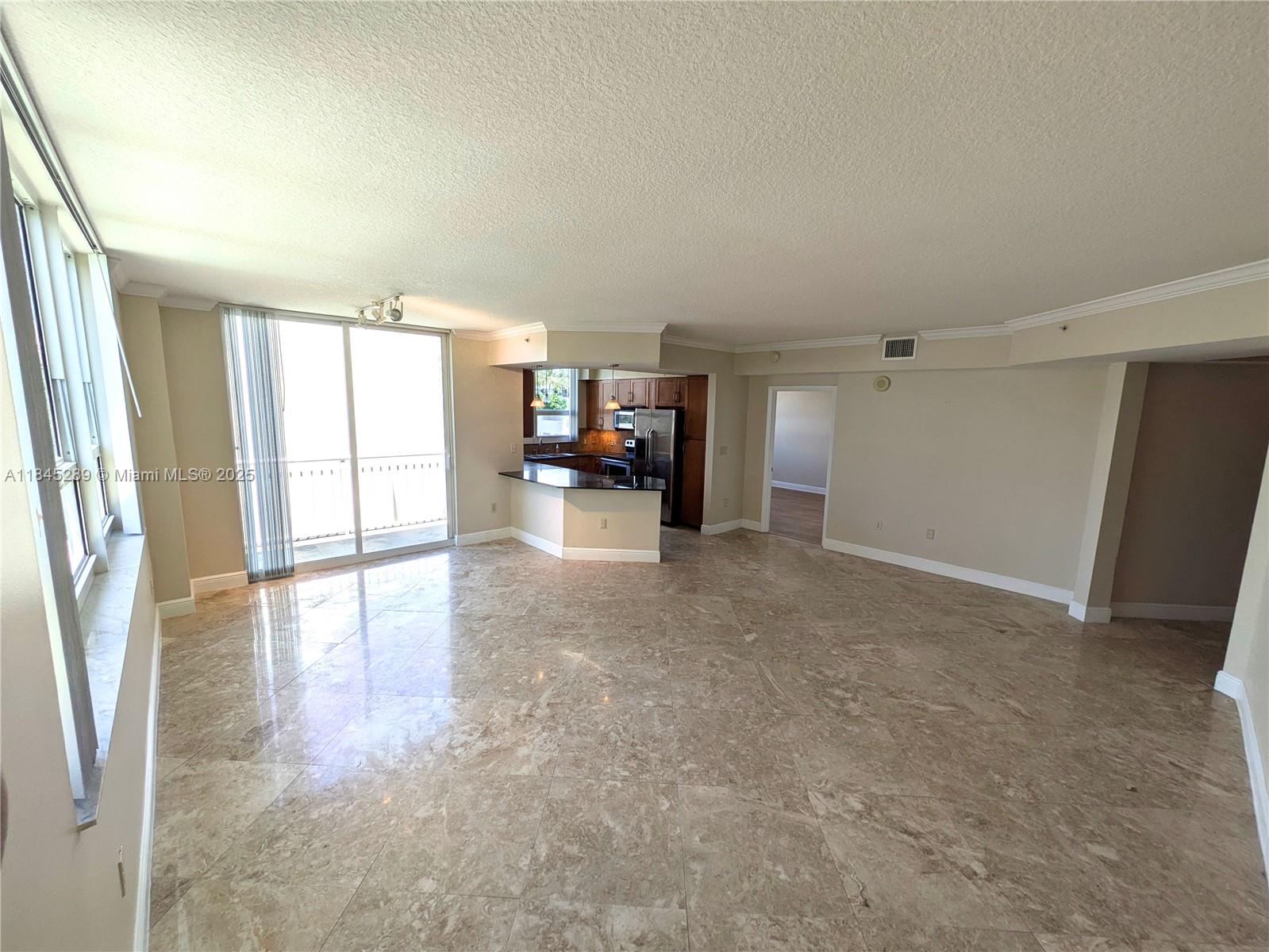 Rarely available, this over-sized 2-bedroom residence offers 1,200+ sq ft of bright and airy living space. Enjoy an open-concept kitchen and living area, tile and wood flooring throughout, large walk-in closets, and a full-size washer & dryer for added convenience. Ideally located in the heart of Edgewater Miami, directly across from Margaret Pace Park and Biscayne Bay. The unit has been professionally painted and cleaned. Vacant and easy to show—schedule your tour today!