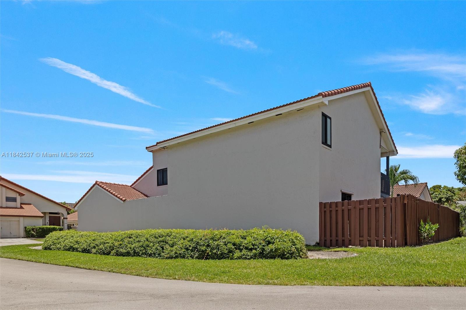 Welcome to The Moors – Fully renovated 2-story dream home in gated community! Located near the Palmetto Expressway, this 4BD/3BA home features a spacious loft, new roof (10-year warranty), impact windows, waterproof laminate flooring, renovated bathrooms, The updated kitchen has quartz counters, wood cabinets, stainless steel appliances, and a pass-through to the living area. One bedroom and full bath are on the first floor; remaining bedrooms and loft upstairs. Oversized master with walk-in closet and luxurious bath with tub and shower. Enjoy 24/7 security, low HOA, and resort-style amenities: clubhouse, gym, guesthouse, and lake great for fishing. Covered patio and pool-sized yard. Firm price – non-negotiable.