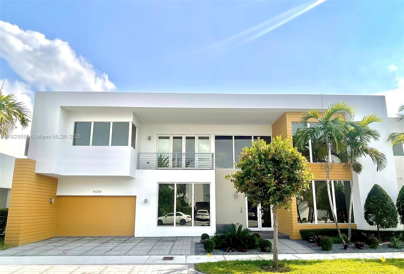 Discover this amazing single-family home in an exclusive gated community in Doral, offering five spacious bedrooms and 5.5 luxurious bathrooms. As you enter, you'll be greeted by a stunning double-height ceiling that enhances the modern design throughout the space. The gourmet kitchen is a chef's dream, featuring top-of-the-line stainless steel appliances that are perfect for entertaining. The master suite boasts a custom walk-in closet, featuring a cabinet that provides ample storage and elegance. Step outside to your private oasis, where a beautiful backyard awaits, complete with a sparkling pool and a built-in BBQ area, including a sink and refrigerator for outdoor dining. Residents enjoy access to a resort-style clubhouse and the peace of mind provided by a 24-hour security patrol.