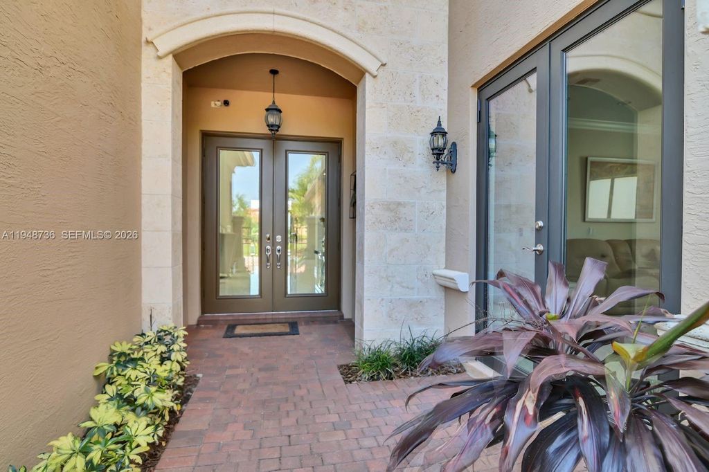 Photo of 9728 Bozzano Dr, Delray Beach, FL 33446 (MLS # A11948736)