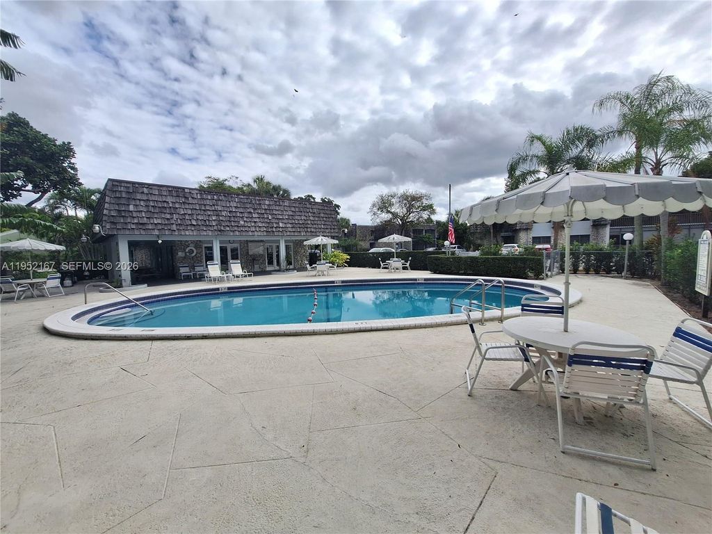 Photo of 3119 E Oakland Shores Dr #C109, Oakland Park, FL 33309 (MLS # A11952167)