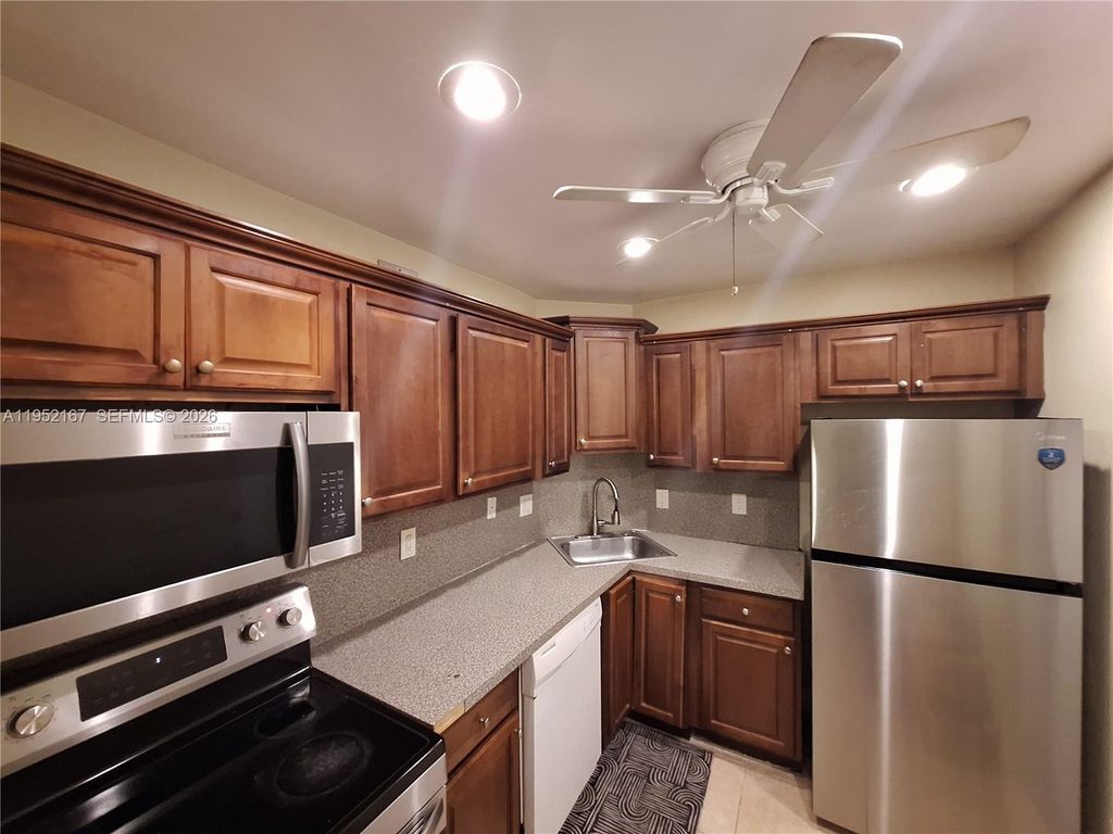 Photo of 3119 E Oakland Shores Dr #C109, Oakland Park, FL 33309 (MLS # A11952167)