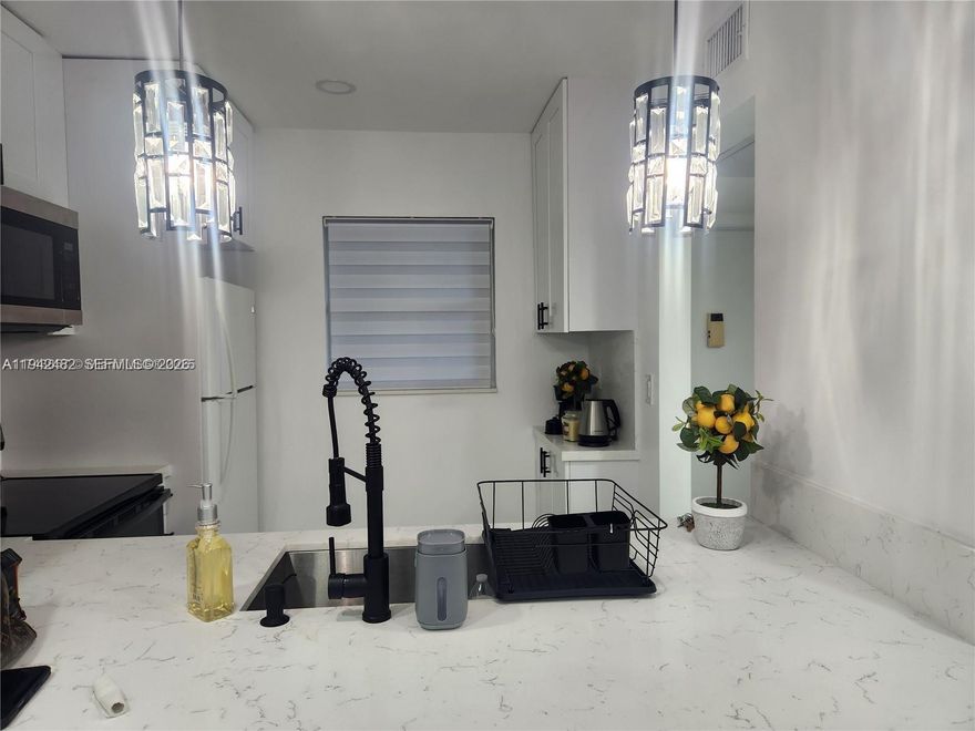 Beautifully upgraded condo in a 55+ community, located on the 3rd floor with serene lake views. Tile flooring throughout, with some furniture included. Enjoy impact windows on the balcony and a newly replaced roof on the building. The community offers excellent amenities, including shuffleboard, gym, billiards and ping-pong tables, and a heated pool—perfect for an active and relaxed lifestyle.