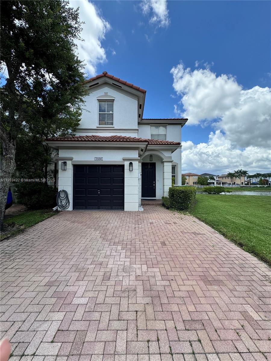 Beautiful, spectacular, and very rare corner and lake townhouse located in one of the best complexes in Doral, Antilles at Islands at Doral, strategically located with easy access to everything. It offers you 3 bedrooms and 2 full bathrooms and 1/2 bath downstairs for guest. Beautiful open and integrated kitchen design with quartz countertop. Amenities include playground, pool and additional access to the beautiful Islands At Doral Club house, which offers you tennis courts, swimming pools, a gym, a basketball court, a children's park and more. Also, you have Doral Legacy park 3 blocks away which is considered the best park in Doral. Wont last, make your appt.