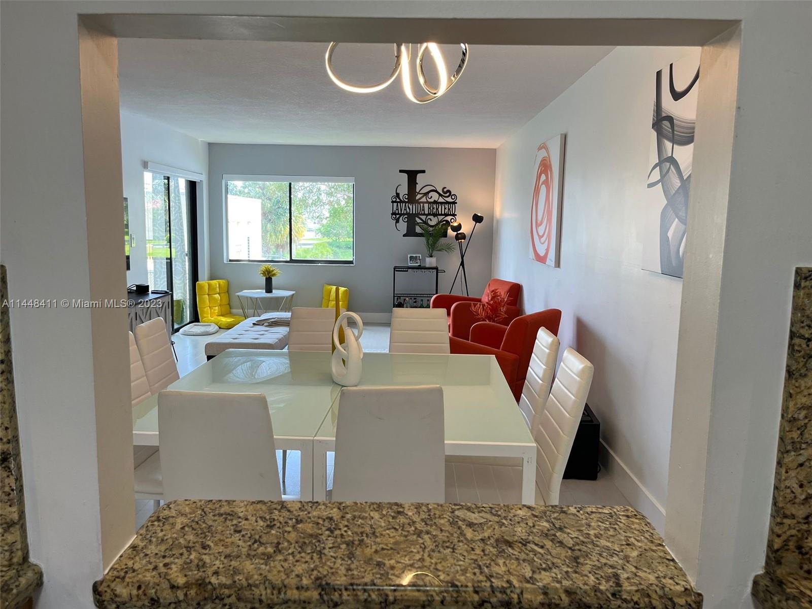 Amazing opportunity to own a seldom available 3BDR/2BTH condo in desirable city of Weston. Excellent A+ schools, beautiful parks and a great lifestyle. This corner unit on the 2nd floor features a split layout. It is freshly painted, no popcorn celling, knockdown celling throughout. Kitchen with granite counter tops, stainless steel appliances, spacious living/dining area, zebra blinds, laminate/carpet flooring, remodeled bathrooms including a shower/tub glass door, good size bedrooms, walk-in closet in master BDR, and stackable washer/dryer. Access to The Exclusive Bonaventure Town Center