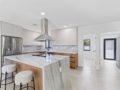 Photo of 610 NE 164th Ter, Miami, FL 33162 (MLS # A12107893)