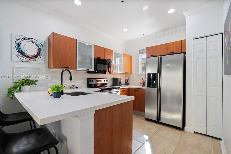 Move right into this spacious and modern 3-bedroom, 3-bath townhome located in a safe, gated neighborhood just minutes from Fort Lauderdale and conveniently right off I-95.
This three-level home offers an open main floor with bright living and dining areas, a functional kitchen, and well-sized bedrooms with additional space to serve as an office space—including an open garage. Each floor provides comfort and flexibility, perfect for families, roommates, or anyone needing extra room.
A rare perk in the area, the home includes a large 2-car garage, providing secure parking and extra storage space.   
Enjoy a clean, well-kept community featuring a pool just steps away from home. Unbeatable access to beaches, shopping, restaurants, and major commuter routes. This townhome is move-in ready and designed for easy living. Minutes away from Ft. Lauderdale airport, shopping and downtown Ft. Lauderdale.

Great location, spacious layout, and immediate availability—make this your next home!