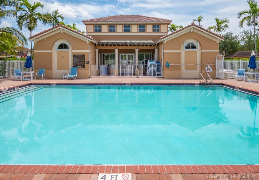 Enjoy this spacious 3 bedroom, 2.5 bath Madrid model featuring an open floor plan, wood laminate flooring and private patio perfect for relaxing and entertaining.  Wonderful community with many amenities including community pool walking distance from the unit, tot lot and fitness center.  Nearby shopping, entertainment, schools and close proximity to the Florida Turnpike.  Available for immediate occupancy with association approval.