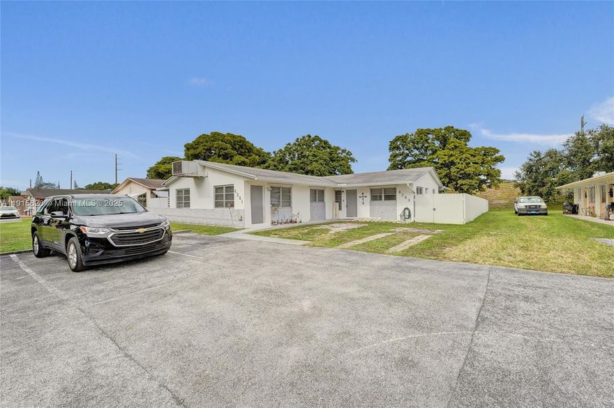 3 Bed 2 Bath Duplex Located in The Driftwood Plaza Neighborhood of Hollywood, FL. Updated with porcelain tile throughout. Luxury Kitchen with Quartz Countertop, Backsplash, Stainless Steel Appliances, and a built-in wine rack. Modern Bathrooms. Split Floor Plan. Screened in patio with a Huge Fenced Backyard. Large Storage Shed and Swing Set. Located on a cul-de-sac.