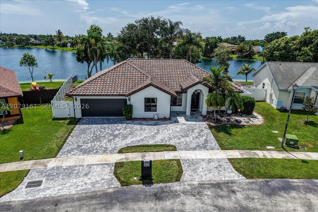 Photo of 15056 SW 10th St, Sunrise, FL 33326 (MLS # A12079161)
