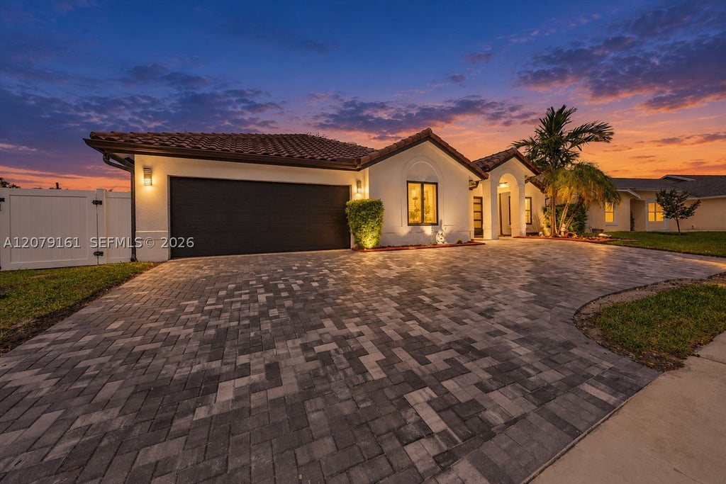 Photo of 15056 SW 10th St, Sunrise, FL 33326 (MLS # A12079161)