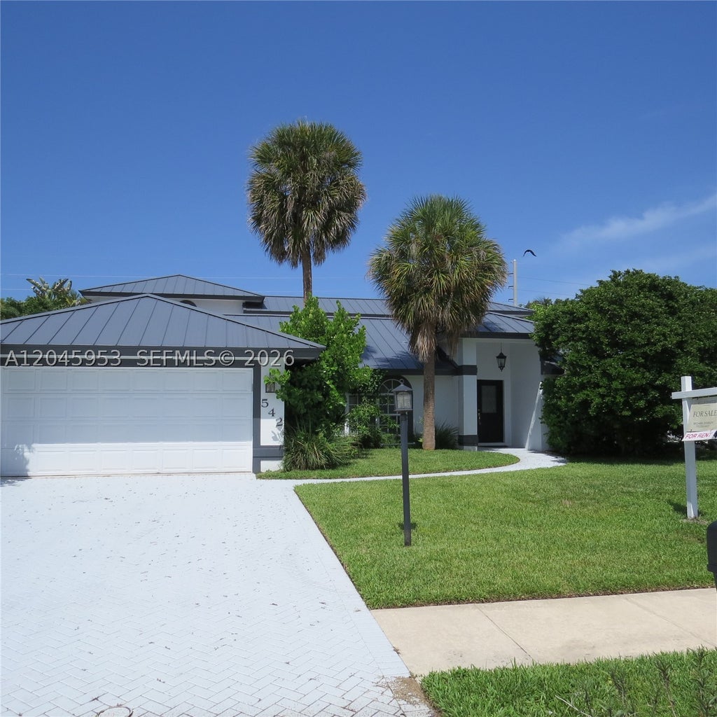 Photo of 542 N Cypress Dr #542, Tequesta, FL 33469 (MLS # A12045953)