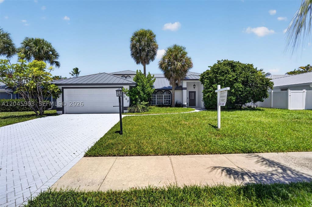 Photo of 542 N Cypress Dr #542, Tequesta, FL 33469 (MLS # A12045953)