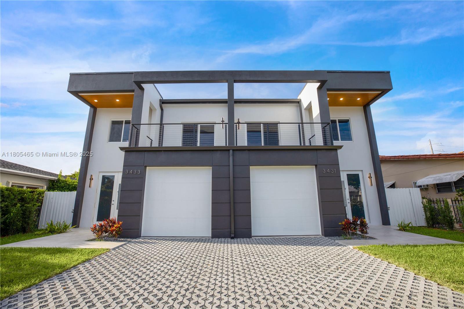 3431–3433 SW 16th Terrace, Miami, just minutes from Coral Gables and Coconut Grove. This modern property features two identical townhomes, each with 3 bedrooms, 2.5 bathrooms, and a 1-car garage that can flex as a 4th bedroom, office, or gym. Each residence offers 2,040 sq. ft. of living space with high ceilings, elegant wood staircases, and custom California-style railings. The chef’s kitchens include Samsung appliances, European cabinetry, and waterfall quartz countertops. Additional high-end finishes include 7 ft. imported Turkish doors, Italian closets, and hurricane-impact windows and doors. Enjoy private covered patios and professionally landscaped surroundings. This is a rare opportunity to own a newly built luxury Townhome in one of Miami’s most desirable locations.