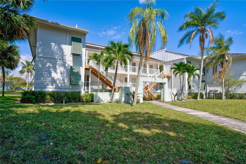 Photo of 162 Cypress Point Dr #162, Palm Beach Gardens, FL 33418 (MLS # A11539965)