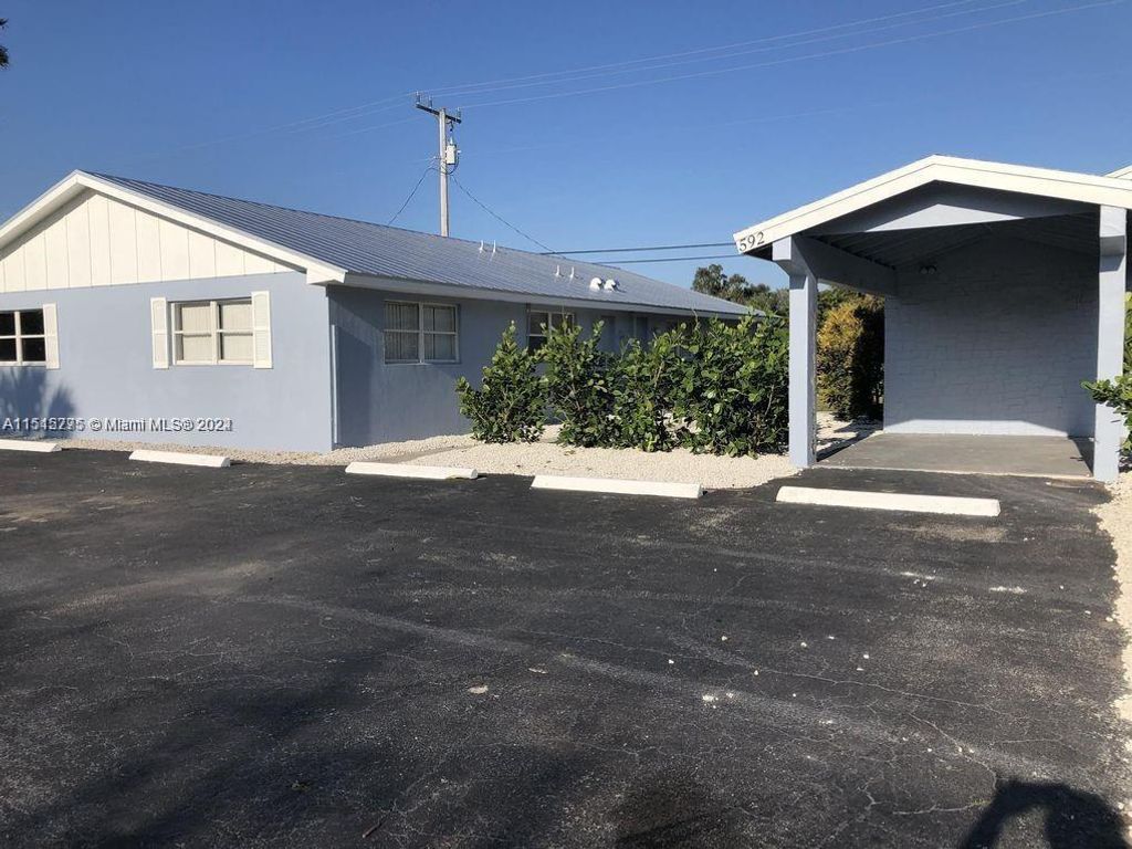 Photo of 592 Holly Dr #B, Palm Beach Gardens, FL 33410 (MLS # A11515775)