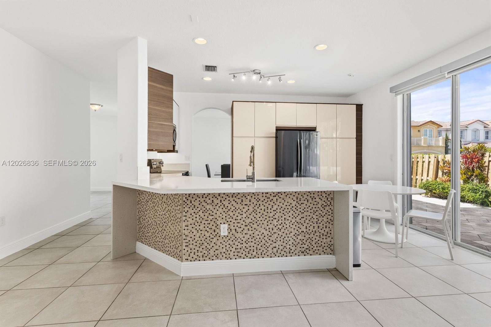 ISLANDS AT DORAL TOWNHOME - Residential