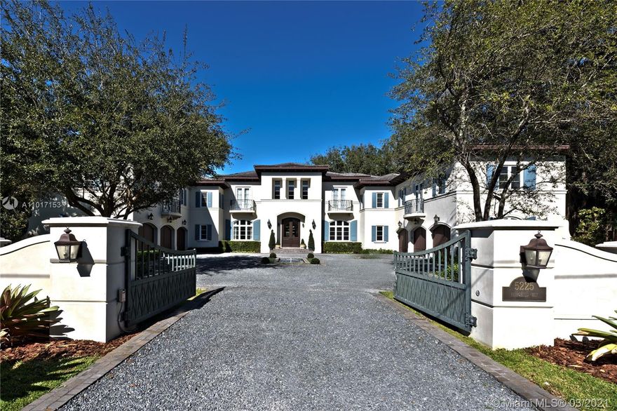 Palatial Estate on 1+ serene, park-like acres in gated Snapper Creek. Classic courtyard & timeless facade evocative of royal French residence. At once elegant & understated w/arched windows, doors & halls. Dramatic, soaring entry w/sweeping stair. Ivory m arble & impeccable wainscoting thruout. Ethereal Master Wing w/vast bath, study, gym, walk-ins. En suite bdrms; dazzling kitchen; wow-factor theater; 6-car garage; resort-style outdoor living.