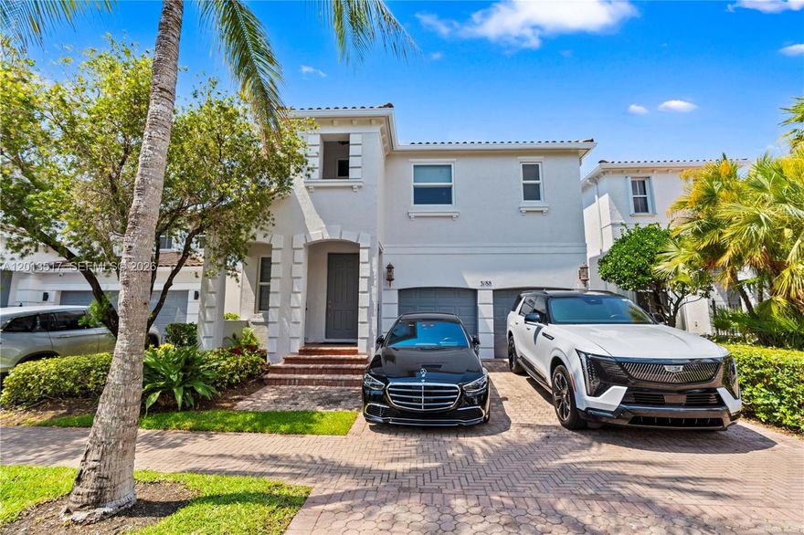 Exquisitely reimagined 5-bedroom, 4.5-bath residence in the prestigious gated community of Aventura Lakes. This exceptional home blends contemporary design with refined finishes, offering an elevated living experience in one of Aventura’s most desirable neighborhoods. Featuring three en-suite bedrooms, a two-car garage, and additional parking for up to three vehicles, the home is filled with natural light and equipped with impact-resistant glass throughout. The open-concept layout is ideal for entertaining, highlighted by a sleek modern kitchen with stainless steel appliances and custom cabinetry that flows seamlessly into the main living areas. 
Upgrades include 75” white porcelain flooring, a glass staircase, imported solid wood magnetic doors, custom closets, designer window treatments, and a fully updated electrical, plumbing, and lighting system. Dual-zone A/C provides enhanced comfort and efficiency. The spacious primary suite offers a spa-inspired bathroom with an oversized vanity and walk-in shower. A fully finished, air-conditioned garage adds flexibility for a gym, playroom, or additional living space. The backyard offers ample space for a pool and outdoor living. Residents enjoy 24/7 security, clubhouse, fitness center, two pools, and beautifully maintained grounds. HOA includes cable, internet, and landscaping. Ideally located minutes from Aventura Mall, fine dining, A-rated schools, houses of worship, and the beach.