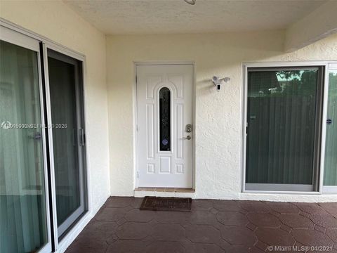 Photo of 7913 Tam Oshanter Blvd #0, North Lauderdale, FL 33068 (MLS # A12015900)