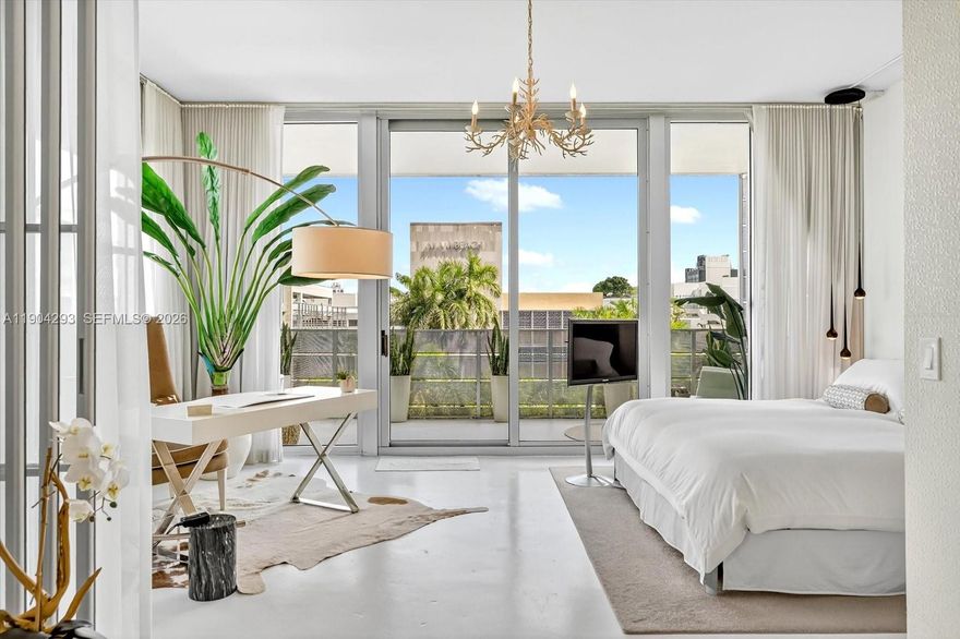 Dramatic and redefined, this sun-drenched PH Loft captures the essence of modern South Beach living.  Featuring soaring 11-foot ceilings, indoor spiral staircase leading to your private rooftop terrace with sweeping city views ideal for entertaining or relaxing, Ornare' custom wardrobe closet and matching walnut kitchen cabinet toppers, Abitare custom hanging and sliding glass partition doors for a seamless open floor plan or close for complete privacy with blackout shades and sheers.  Flexible open layout currently configures as a one bed loft, that is large enough to add a second bedroom.  Ideally located just steps from Lincoln Road, the beach, and the best restaurants and shops South Beach has to offer. Live amid the vibrant energy or create your own tranquil oasis above it all.