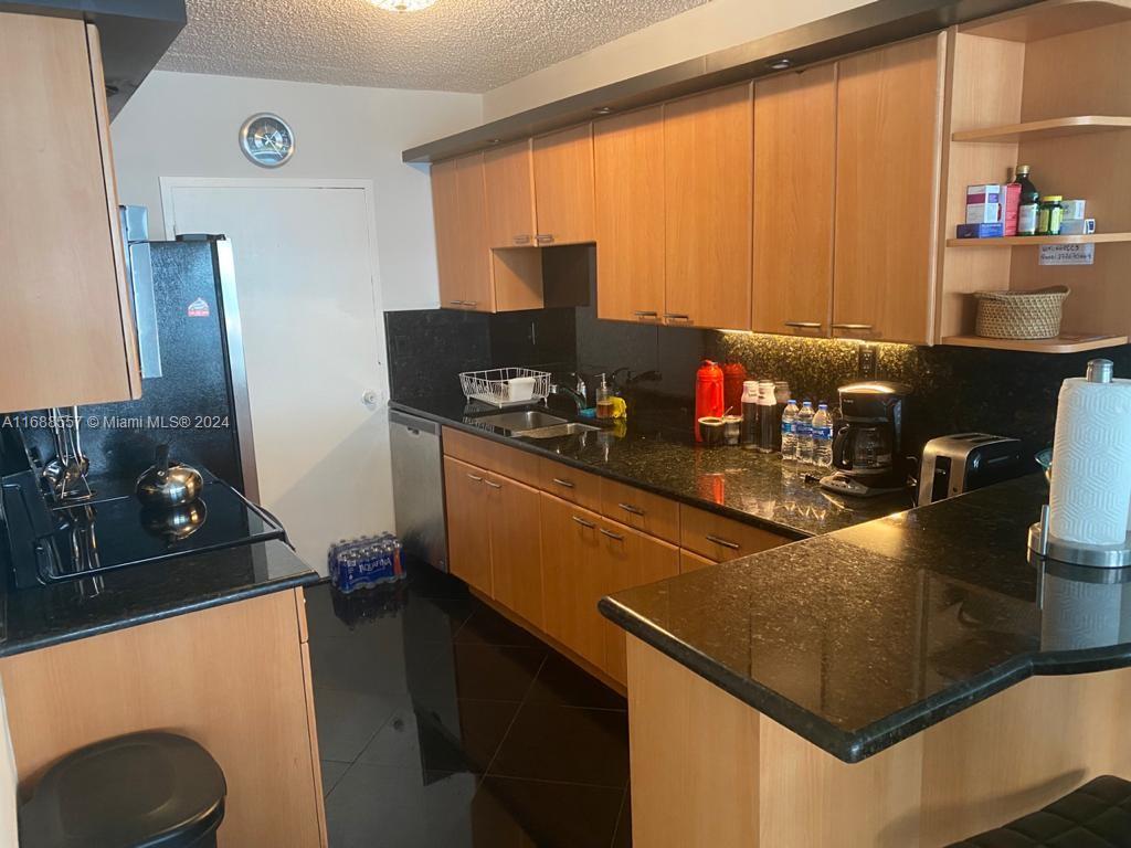 THE CARRIAGE HOUSE CONDO - Residential