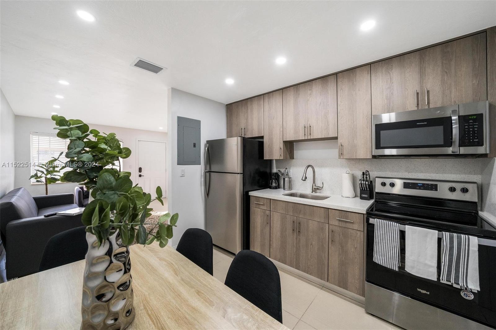 This is a Fully updated furnished or unfurnished Apartment. It is Conveniently Located 3 Minutes from Miami International Airport and Close to the Gables, Miami Beach, etc. This Unit is Fully Updated and has 2 bedrooms and 1 bath.  Completely Remodeled Kitchen with wood cabinets and granite countertop.  Amazing new bathroom and all tiled.  This unit has a private yard with a Washer & Dryer and its own parking space.  A Must See! Ready to Move In!!!