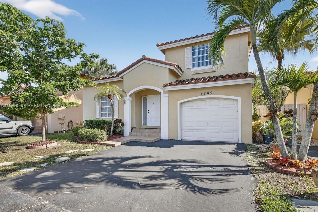 Photo of 1245 NW 125th Ter, Sunrise, FL 33323 (MLS # A11989065)