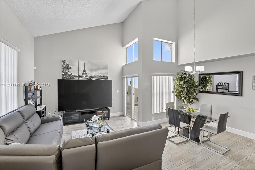 Photo of 1245 NW 125th Ter, Sunrise, FL 33323 (MLS # A11989065)