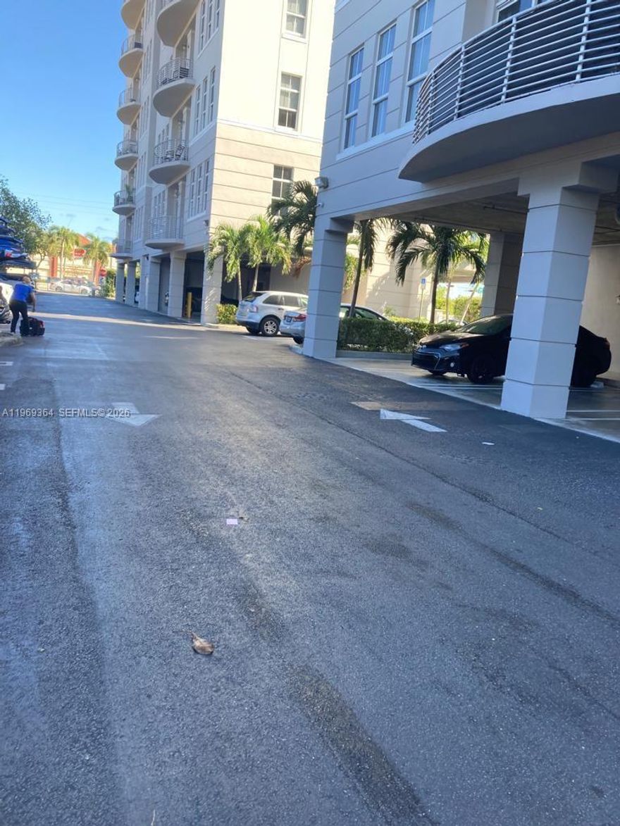 2 beds 2 baths unit with great views and 2 parking spots at SKYLOFTS in North Miami Beach. This bright sunny unit features a balcony with sliding doors. Ample room for dining table, home office living space all in one open concept. Kitchen has modern cabinetry and stainless appliances as well as a breakfast bar. Walk to Publix (across the street), Starbucks, gym and several restaurants. Featuring a walk in closet in master bedroom, designer lighting, modern window shades and freshly painted. Boosting A rated schools, convenient shopping and walk to many places of worship. As this is a loft style apartment, Master bedroom doesn't have a door. Complex is gated with access code entry. In house amenities include pool.