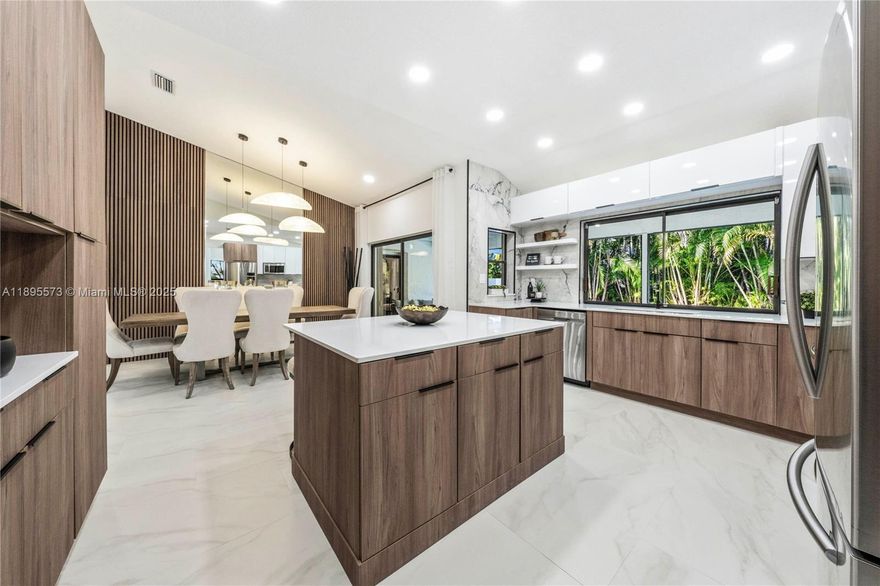 Welcome to this magazine-worthy 4/2.5 retreat nestled on a quiet cul-de-sac corner lot in the heart of Cypress Run. Step inside & fall in love w/ the soaring ceilings, custom cabinetry & expansive living spaces centered around a statement fireplace that radiates warmth & style.The chef’s kitchen is the true heart of the home featuring quartz, a center island & abundant storage, perfect for hosting dinner parties or casual mornings w/ coffee & sunlight streaming in.Unwind on your patio overlooking a sparkling pool & spa, surrounded by tropical landscaping & total privacy—your own slice of S Florida paradise. Roof 2019, AC 2019, Water Heater 2022, Impact Windows 2023.
Located minutes from top-rated schools, parks & shopping, this home perfectly blends comfort, convenience & designer flair.