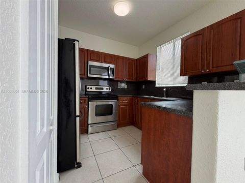 Tiny photo for 6940 NW 177th St #P104, Hialeah, FL 33015 (MLS # A12008064)