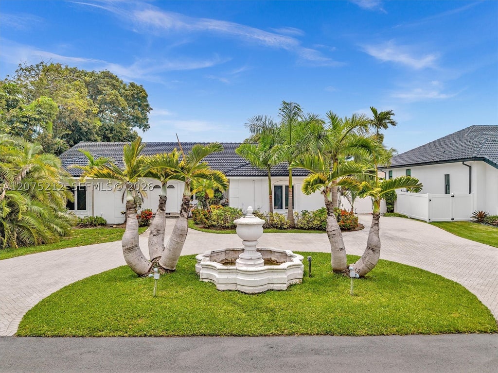 Photo of 413 Tamarind Dr, Hallandale Beach, FL 33009 (MLS # A12075212)