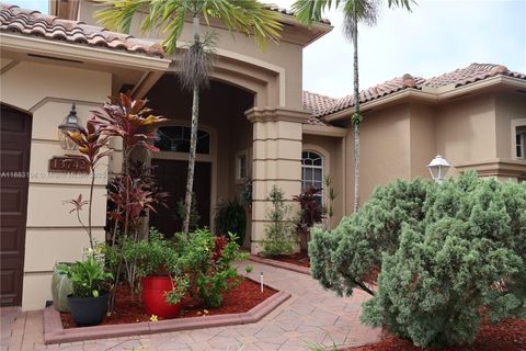 Photo of 13742 NW 11th Ct, Pembroke Pines, FL 33028 (MLS # A11883196)