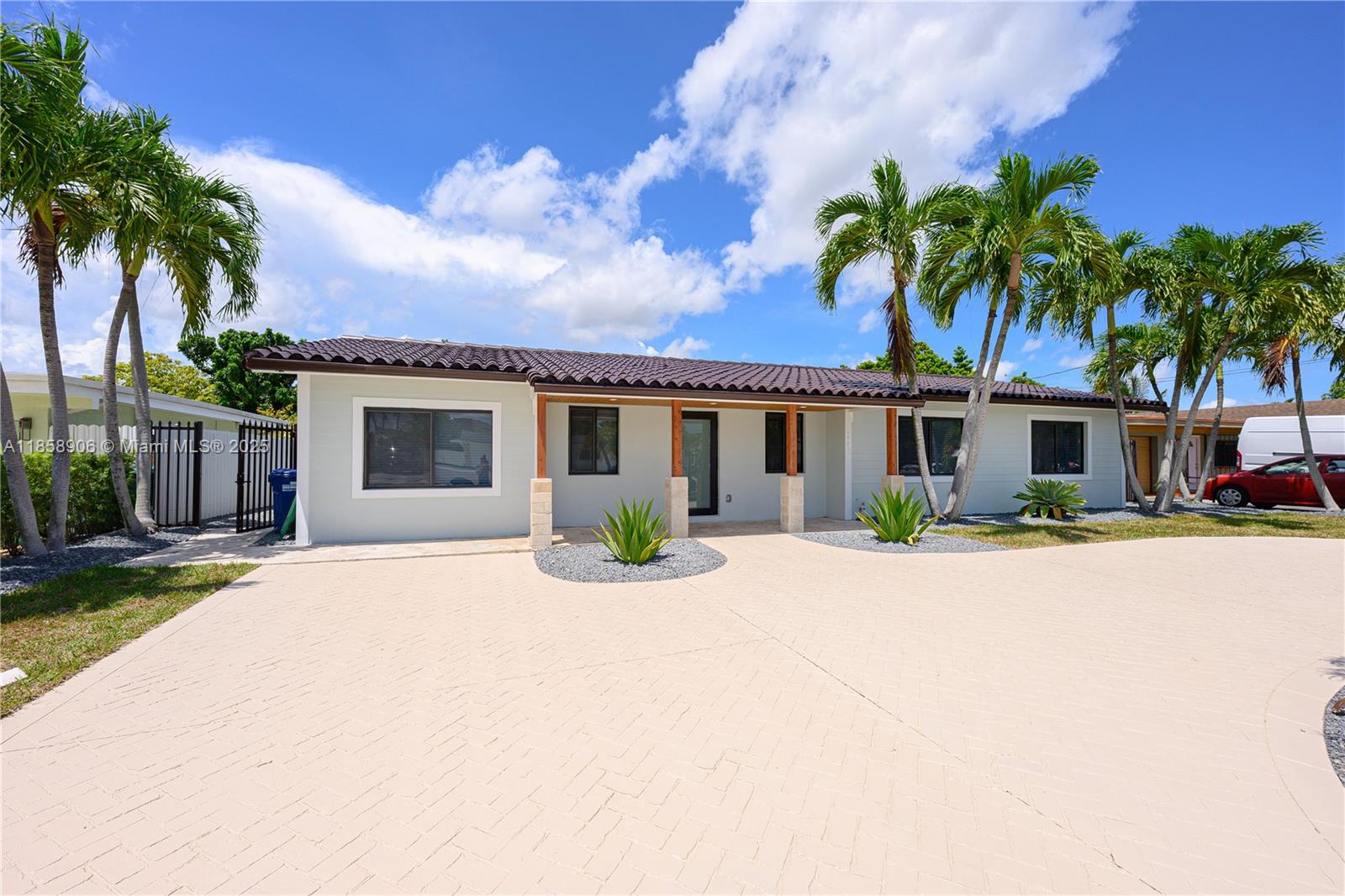 Beautifully renovated modern single-family home with pool in sought-after Southern Estates. Features a spacious open layout, gourmet kitchen with large island, and a primary suite with walk-in closet and luxurious marble en-suite—complete with spa tub, walk-in shower, and dual sinks. Backyard oasis boasts turf grass and serene canal views. Conveniently located near the Florida Turnpike.