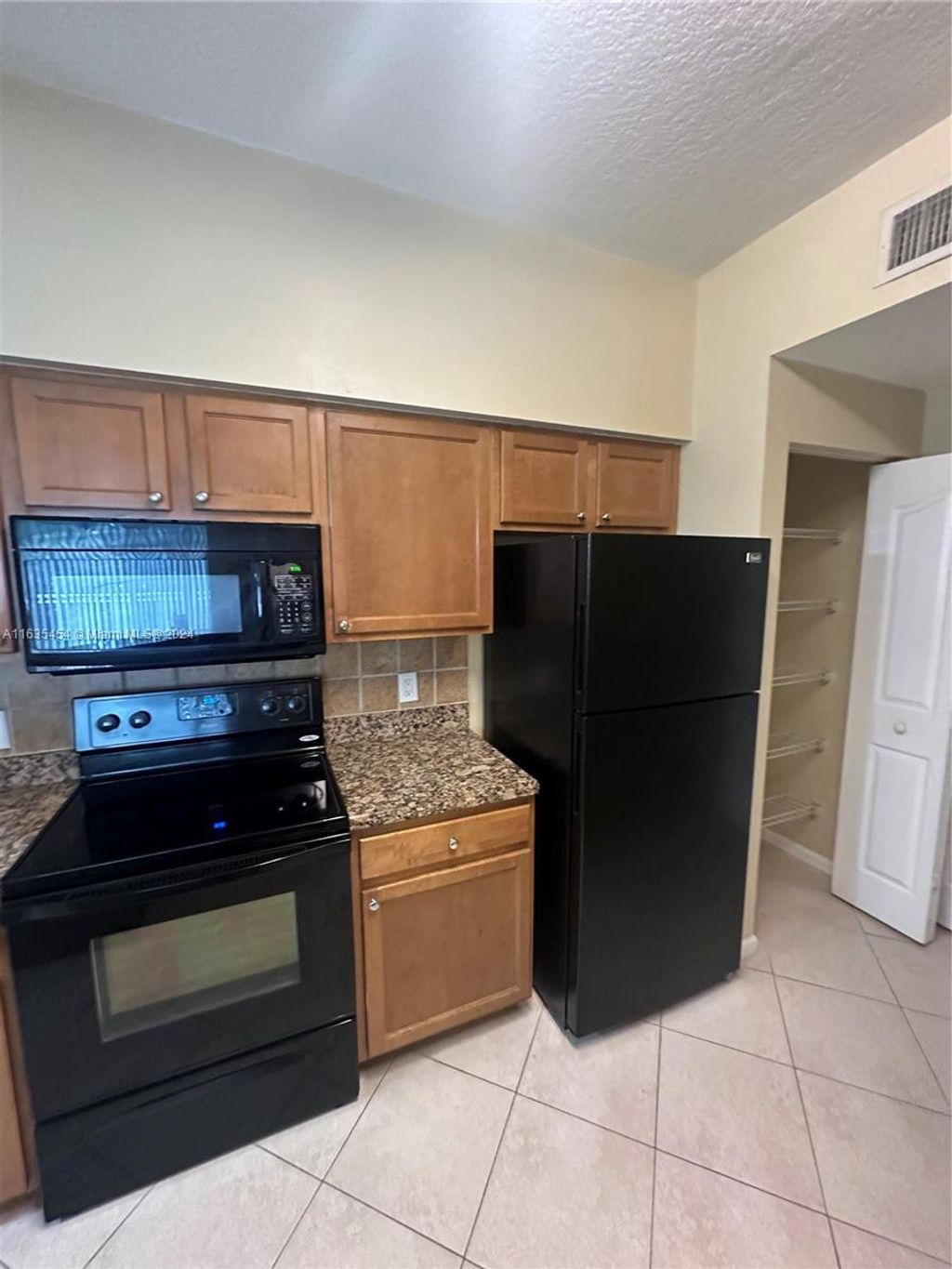 Photo of 2212 E Myrtlewood Cir E #2212, Palm Beach Gardens, FL 33418 (MLS # A11635454)