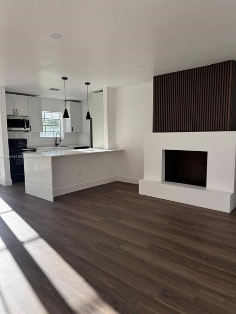 Photo of 2411 SW 50th Ter, Fort Lauderdale, FL 33317 (MLS # A11894876) Photo of 2411 SW 50th Ter, Fort Lauderdale, FL 33317 (MLS # A11894876)