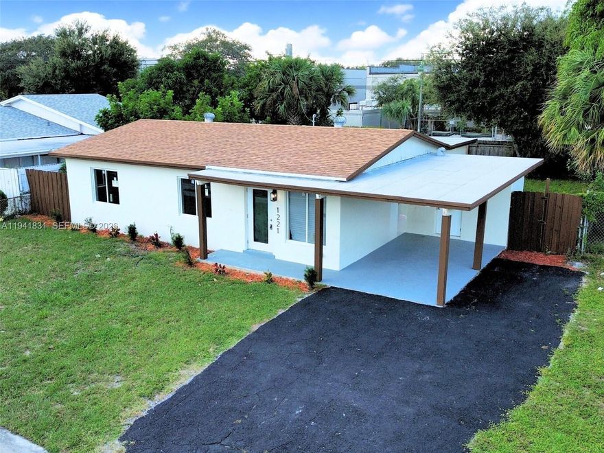 TURNKEY FULLY REMODELED + FULLY PERMITED UP TO CODE. Beautiful single family 3/2 with ~1,132 SF under air. Comprehensive remodel with city permits. Plumbing, Electricity, Impact Windows, Impact Doors, Mechanical, Water/Heater, A/C, and new appliances... Bright Open Kitchen with sleek countertops, pantry, and indoor laundry. Durable vinyl flooring throughout. Covered carport plus an exterior storage room that offers future conversion potential to add another room. Close to shopping, dining, medical centers and I-95. ~15 min to Downtown West Palm Beach/Rosemary Square and ~3.5 mile to Peanut Island.