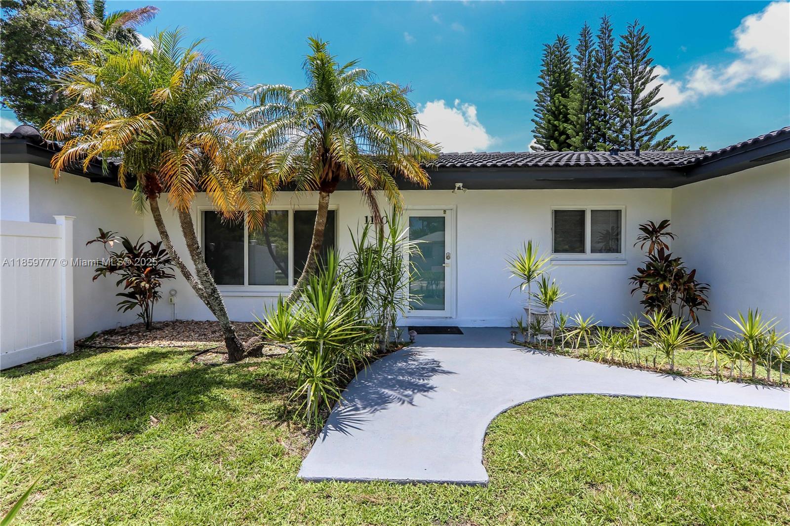 Welcome to this charming 4-bedroom + DEN, 3-bath, pool home for rent in the desirable Hollywood Lakes neighborhood. Situated on a large corner lot with full PVC privacy fencing, this home offers a spacious layout and a private backyard oasis perfect for relaxing or entertaining. The primary bathroom features a beautiful clawfoot tub and a separate walk-in shower. Enjoy the comfort of impact windows and doors, newer A/C units, and a large patio area ideal for outdoor living. A separate mother-in-law suite with a screened porch provides added flexibility for guests or extended family. Conveniently located near beaches, lakes, the Intracoastal, schools, parks, shopping, dining, houses of worship, and major highways, this home combines comfort, style, and unbeatable location.
