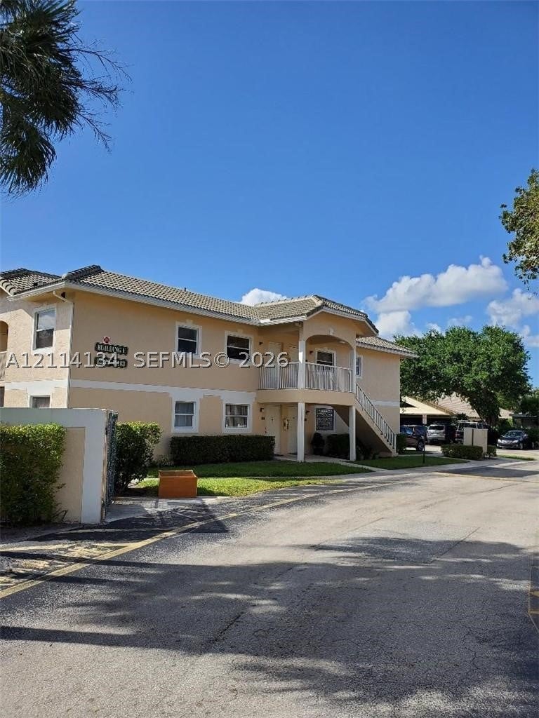 Photo of 12143 Royal Palm Blvd #8E, Coral Springs, FL 33065 (MLS # A12114134)