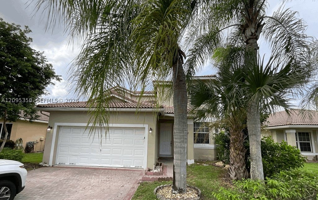 Photo of 11867 SW 7th St, Pembroke Pines, FL 33025 (MLS # A12095358)