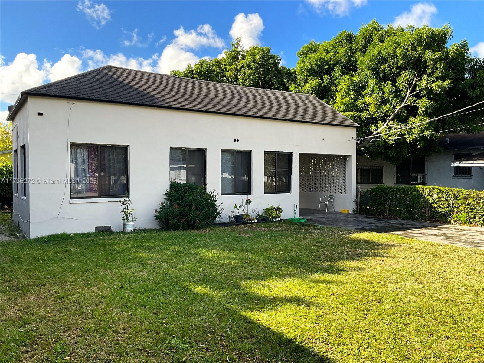 3 bed 2 bath single family home with 1,291 SF on a street with upgraded homes. Home is tenant occupied at $3,322 through 4/19/25. New hurricane windows in 2021. The remodeled open kitchen has granite counters, stainless steel appliances, washer & dryer. Updated baths. Property is fenced with parking for two or more cars & possibly a boat or RV. Buyer may want to enclose carport for more living space. Duplex-zoned lot may have more room for a 2nd unit or an addition to the primary house. 2 blocks to Earlington Heights Metrorail Station! Low taxes. House is within walking distance to elementary & middle schools, & 1 block to high school. Close to I95, Wynwood, Midtown, Design District, downtown, & the airport.