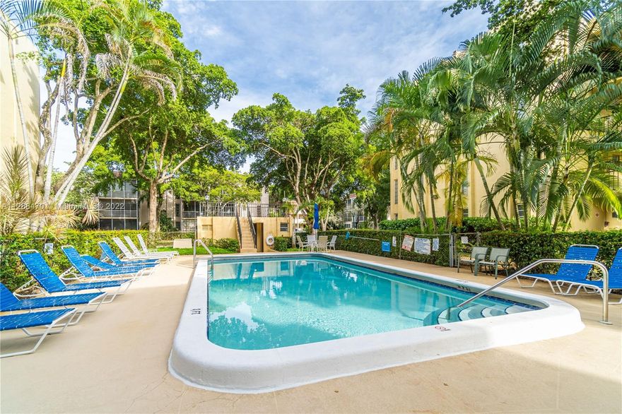 Well maintained Corner Condo in the heart of Plantation. Located on the 1st Floor, Move In Ready, Oversized Screened Balcony with Shutters, Ceramic Tile throughout, Kitchen opens up to Dining Room area and Oversized Living Area. Nice Community Pool and Garden area, laundry room on each floor, One Assigned Parking Space (Max 2 Cars), Pet Friendly Dog/Cat up to 25lbs (max 2), Small Complex only 56 Units. Water, Trash, Pest Service included in Monthly Fee. Currently being used as a 2 bed with extra-large living room, GREAT for Entertaining! (3rd bedroom wall removed, can easily be converted back) GREAT LOCATION, Walking distance to Publix and close to Shopping Malls, Restaurants, Library, Schools and just minutes to the Beach! Must see! Won't last!
