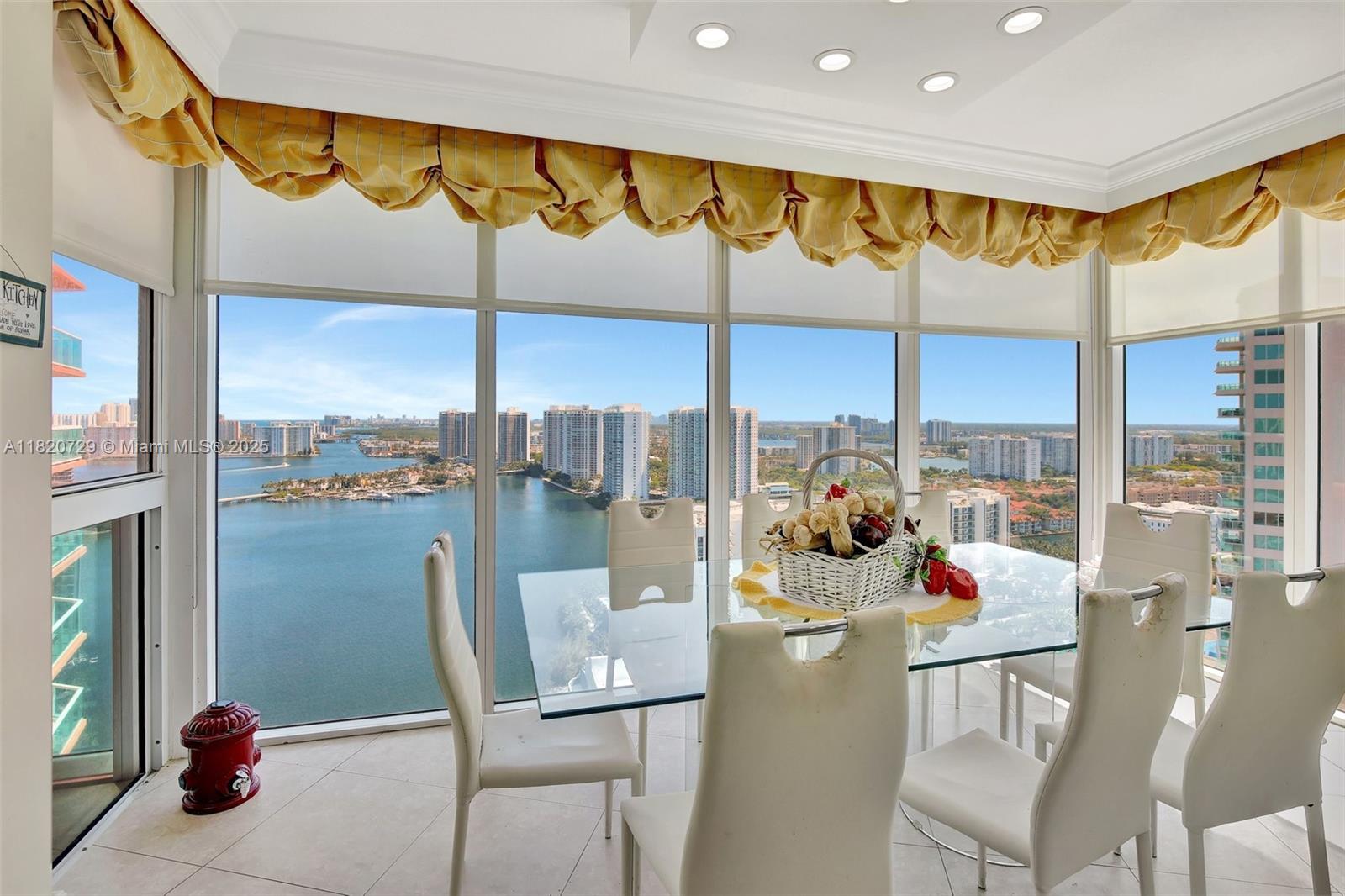 Wow! Enter This Fabulous 2720 Sf Residence From Semi Private Elevator Foyer & Immediately See the Best Direct Ocean, Intracoastal, Golf Course/ Lake Views From Floor to Ceiling Windows + 2 Expansive Terraces. Sunrise and Sunset! This Premier Redone Palace in the Sky in Hidden Bay Has It All! Finest Finishes Including: Completely Redone White State of the Art Gourmet Kitchen, Split Floor Plan, Primary Suite Featuring Room Sized Closet and Ensuite Bathroom. This 3 Bed + Den is Professionally Designed and Being Sold Furnished. A Must See! Enjoy the 5 Star Amenities of a Private Resort on 24 Guard Gated Acres Surrounded on 2 Sides by Water. 2 Story Spa & Health Club, Private Marina, 3 Tennis Courts, 2 Pickleball Courts, 2 Pools, 24h Security, Valet, Concierge & Much More!
