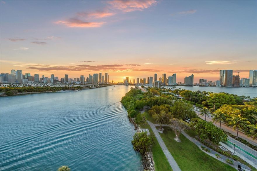 MODERN INDUSTRIAL DESIGN DUPLEX WITH BREATHTAKING MIAMI SUNSET VIEWS OVER THE SPARKLING BAY & MIAMI SKYLINE ON THE COVETED VENETIAN ISLANDS! Upgraded Two-Story 1 Bed, 1.5 Bath Townhouse in the Sky features Stylish Industrial Interior Design finishes like Exposed Cement, Plexiglass Staircase & Venetian Plaster throughout. This West-Facing Residence enjoys Stunning Bay & Park Views from Floor to Ceiling Windows on Both Levels. White & Bright Open Kitchen with New Stainless Steel Appliances & Breakfast Bar. Modern Bedroom with Terrace + Bathroom with Rainshower. 1000 Venetian Way is a Boutique Building with World-Class Amenities such as Concierge, Valet, Pool, Gym, Tennis Courts, Spa + Dog Park ideally located on the Venetian Causeway between Downtown Miami & South Beach.