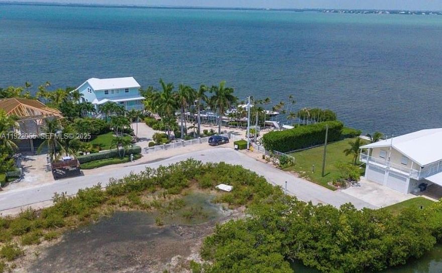 Discover one of Cudjoe Key’s desirable vacant parcels — a 6,000 sq ft waterfront lot offering direct access to the Lower Keys’. Located on a quiet road, this property pairs privacy with easy access to local conveniences and the laid-back lifestyle of the Lower Keys. Enjoy morning coffee with ocean breezes, evening skies, and endless outdoor living possibilities.
(Information provided herein is deemed reliable but is not guaranteed and should be independently verified. Subject to errors, omissions or changes without notice)