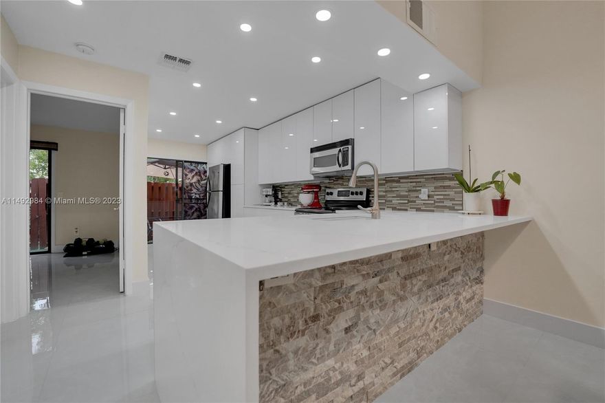 Fully renovated townhouse just steps from the beach, 2 beds, 2 baths, a new kitchen, and elegant updates throughout, this home offers a sophisticated living experience. The open-concept layout, ample natural light, and stylish flooring create a modern feel. The bathrooms feature exquisite tile work and premium finishes for a spa-like retreat. Located in a peaceful neighborhood, this townhouse provides a serene coastal lifestyle with easy access lots of shops, dinning and about a mile from the beach. Don't miss the chance to make this fully renovated beach townhouse your dream home.