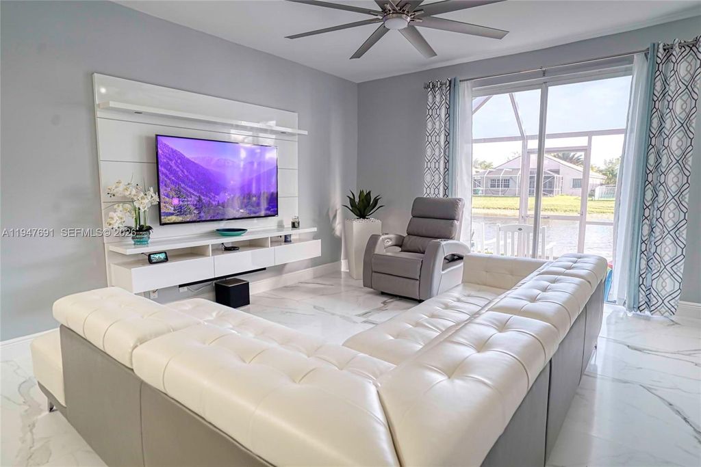 Photo of 1261 Presidio Dr #5-42, Weston, FL 33327 (MLS # A11947691)