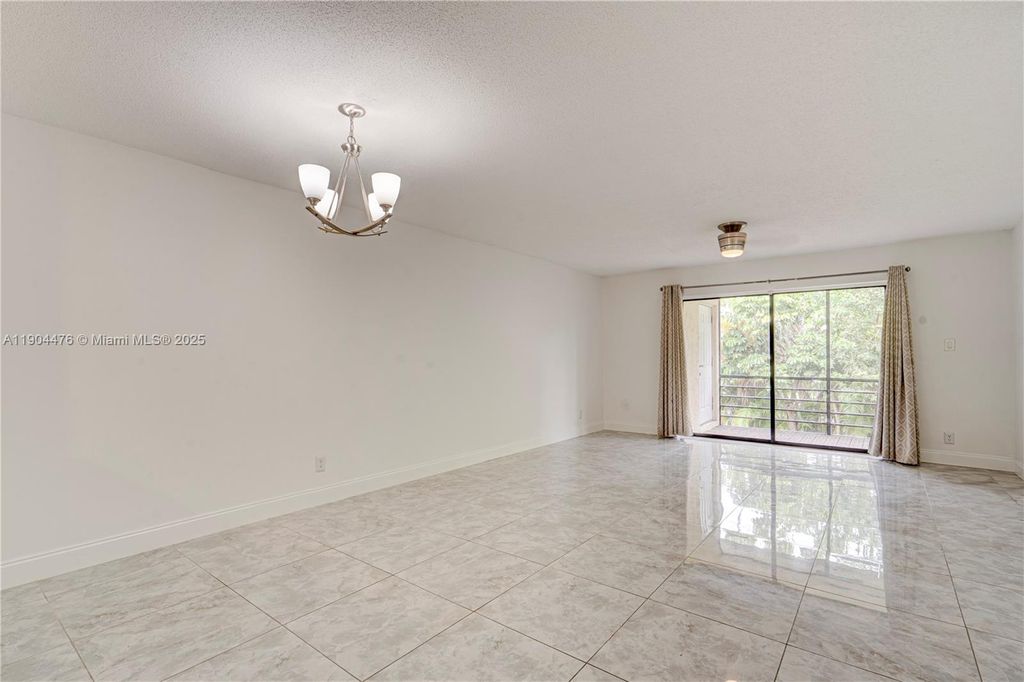 Photo of 136 S Cypress Rd #323, Pompano Beach, FL 33060 (MLS # A11904476)