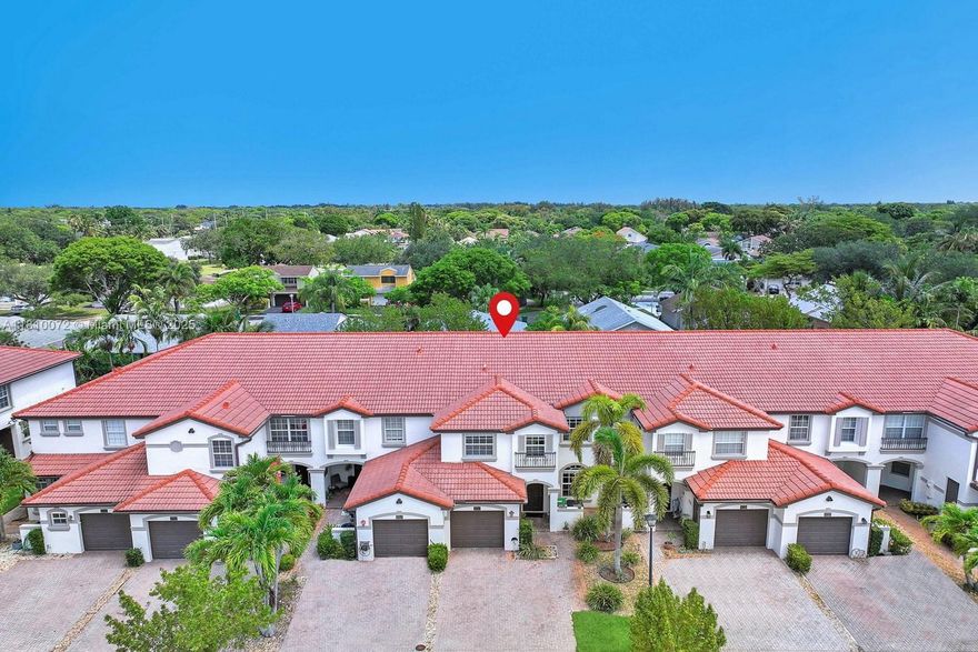 Welcome to this beautiful 4-bed, 3-bath townhouse in the sought-after gated community of Darlington Park in Cooper City. Spacious, open floor plan & abundant natural light, this home is designed to be both inviting & functional. The oversized primary suite is a peaceful retreat, complete with a walk-in closet, a cozy sitting area perfect for quiet moments, working, or reading, & a spa-like bath with double sinks and a soaker tub. Bedroom & full bath downstairs, second-floor laundry. Outside, the serene backyard offers a space for relaxation or hosting gatherings. Located in the fantastic Cooper City school district, with shopping, dining, major highways, & the Hard Rock just minutes away, this home combines convenience, comfort, and style. Community has a pool & serene pond with fountain.